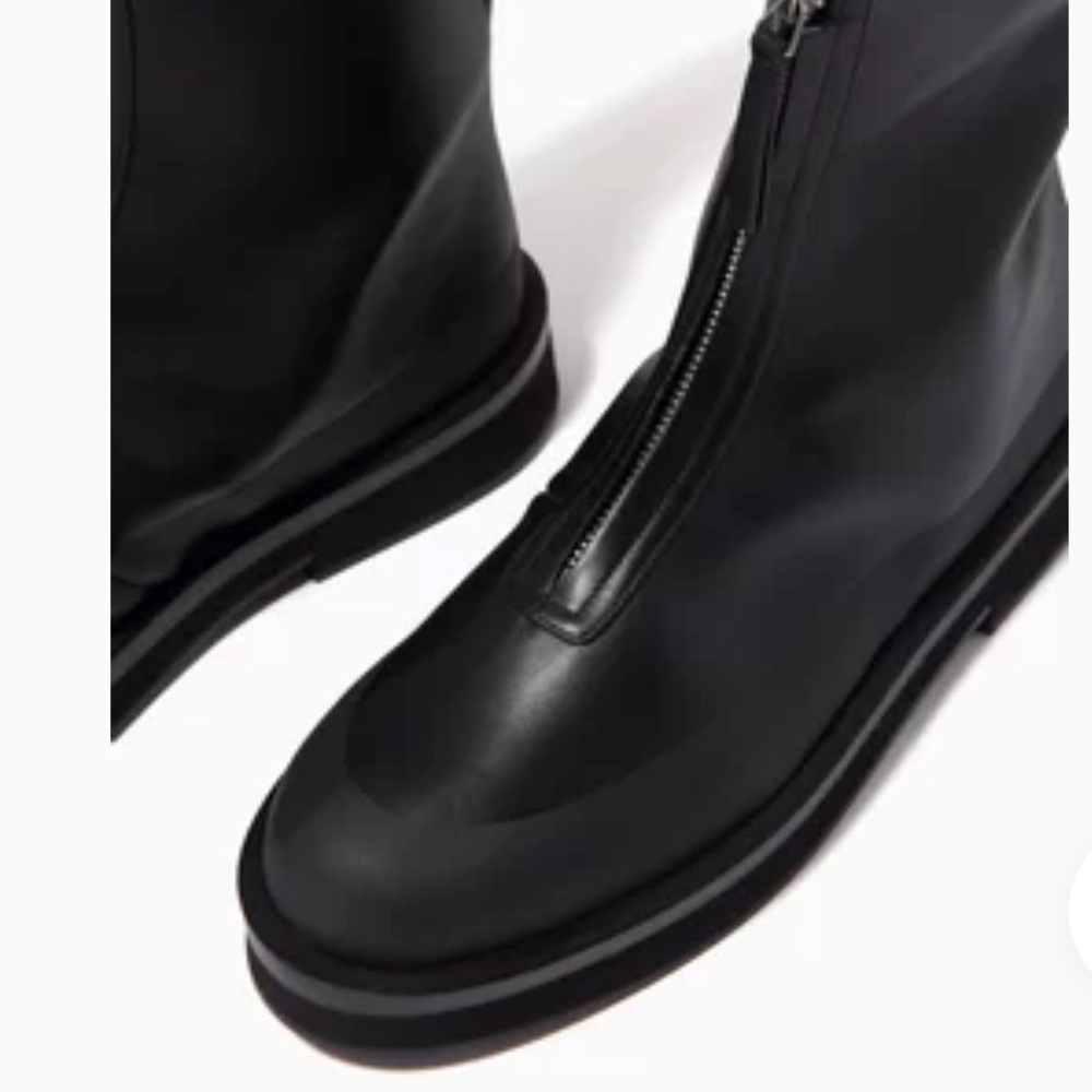 Neous black combat boots